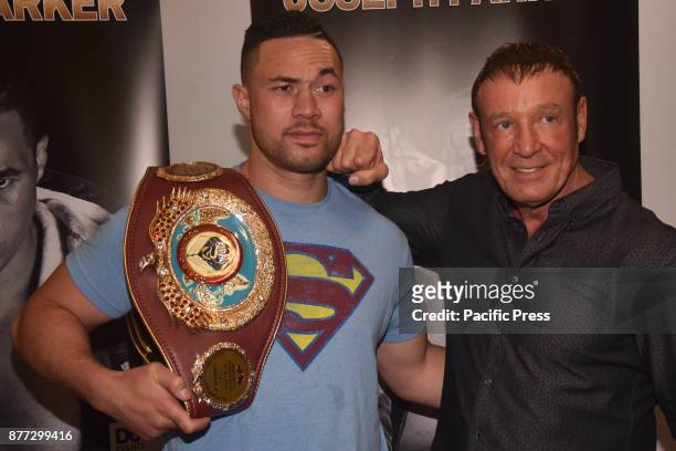 New Zealand heavyweight boxer Joseph Parker and his coach Kevin Barry pose for camera after a press conference in Auckland on Nov 22, 2017. He is...