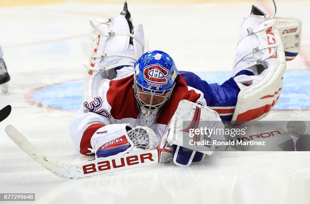 Charlie Lindgren of the Montreal Canadiens makes a save against the Dallas Stars in the third period at American Airlines Center on November 21, 2017...