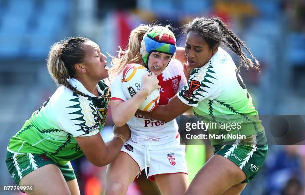Jodie Cunningham of England is tackled during the Women's Rugby League World Cup match between England and the Cook Islands at Southern Cross Group...