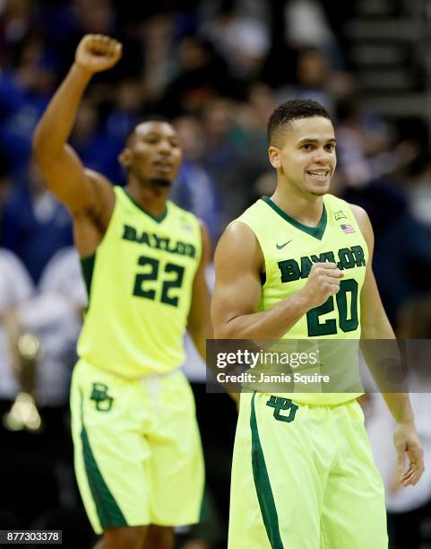 Manu Lecomte and King McClure of the Baylor Bears celebrate as the Bears defeated the Creighton Bluejays to win he National Collegiate Basketball...