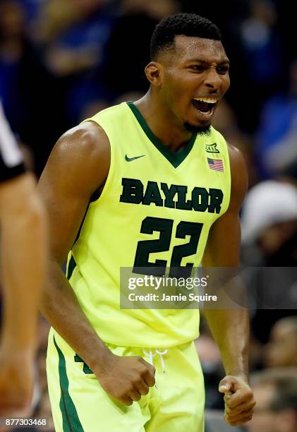 King McClure of the Baylor Bears celebrates as the Bears defeat the Creighton Bluejays to win the National Collegiate Basketball Hall Of Fame Classic...