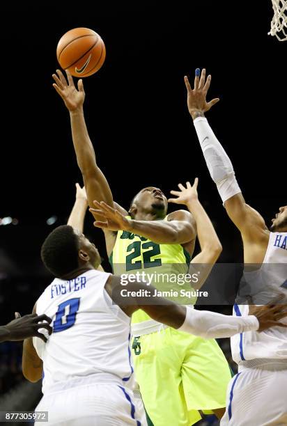 King McClure of the Baylor Bears shoots during the National Collegiate Basketball Hall Of Fame Classic Championship game against the Creighton...