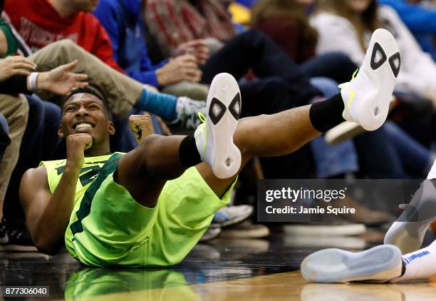 King McClure of the Baylor Bears celebrates after a foul during the National Collegiate Basketball Hall Of Fame Classic Championship game against the...