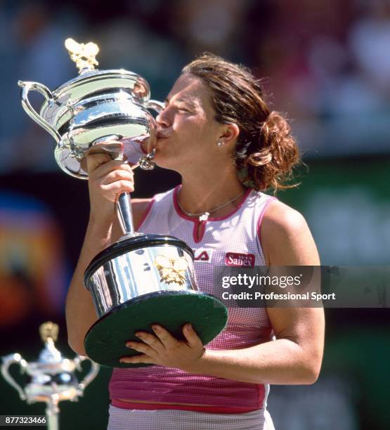Jennifer Capriati of the USA kisses the trophy after defeating Martina Hingis of Switzerland in the Women's Singles Final of the Australian Open...