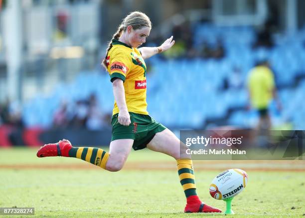 Maddie Studon of Australia attempts a conversion during the Women's Rugby League World Cup match between the Canadian Ravens and the Australian...