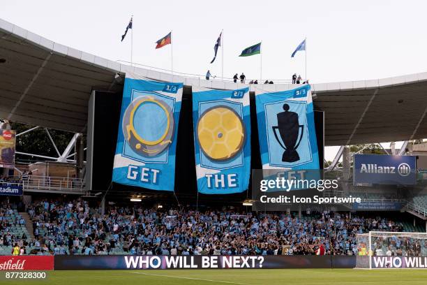 Sydney FC fans hang a banner from the stadium roff at the FFA Cup Final Soccer between Sydney FC and Adelaide United on November 21, 2017 at Allianz...