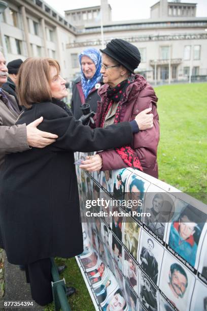 Relative of a victim is hugged outside the court before former Bosnian military chief Ratko Mladic appears for the pronouncement of the Trial...