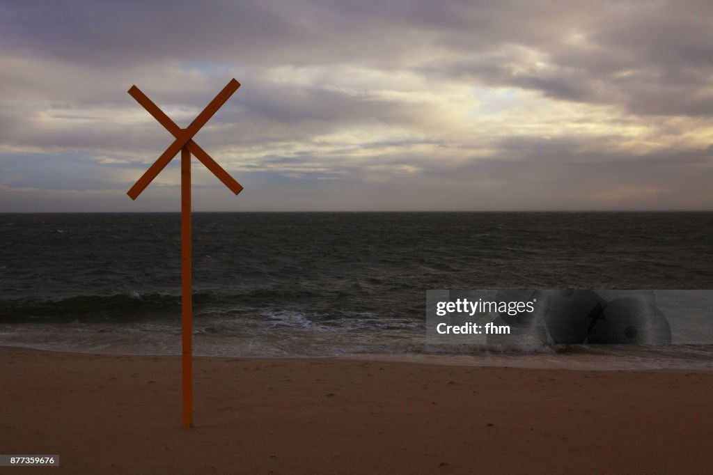 X-sign on the beach of Sylt (Schleswig-Holstein, Germany)