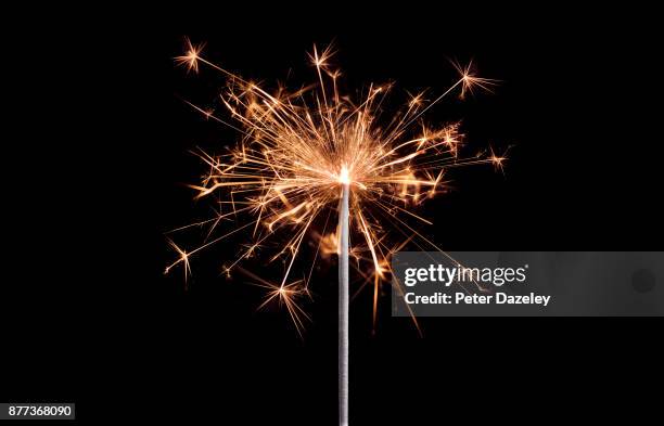 sparkler celebration with copy space - bengala fuego artificial fotografías e imágenes de stock