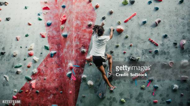 solo session at the climbing centre - climber imagens e fotografias de stock