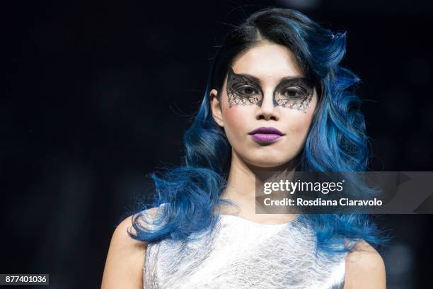 Model is seen during the John Paul Mitchell Systems -Running with Scissors by Robert Cromeans show at On Hair By Cosmoprof Autumn Edition on November...