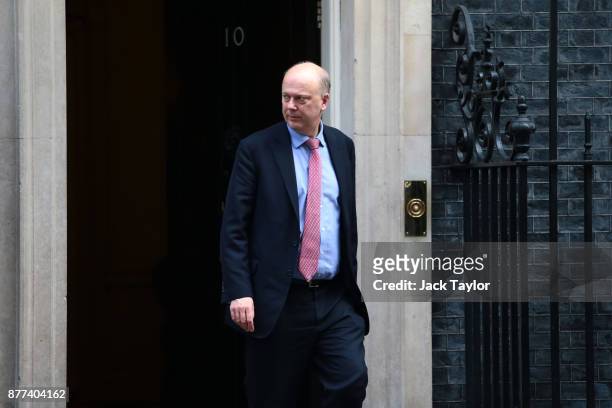 Secretary of State for Transport Chris Grayling leaves after a cabinet meeting ahead of the Chancellor's annual budget at 10 Downing Street on...