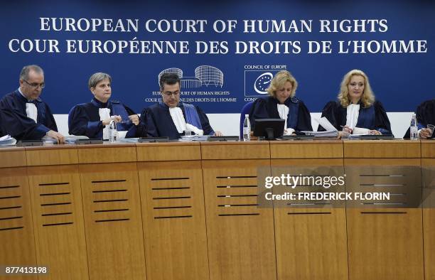 Judges of the European Court of Human Rights get ready to take part in a Grand Chamber hearing in the case of former prime minister of Italy Silvio...