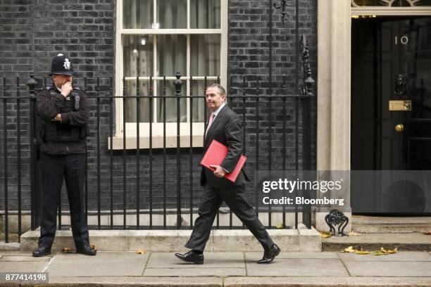 Liam Fox, U.K. International trade secretary, leaves number 10 Downing Street following a pre-budget cabinet meeting in London, U.K., on Wednesday,...