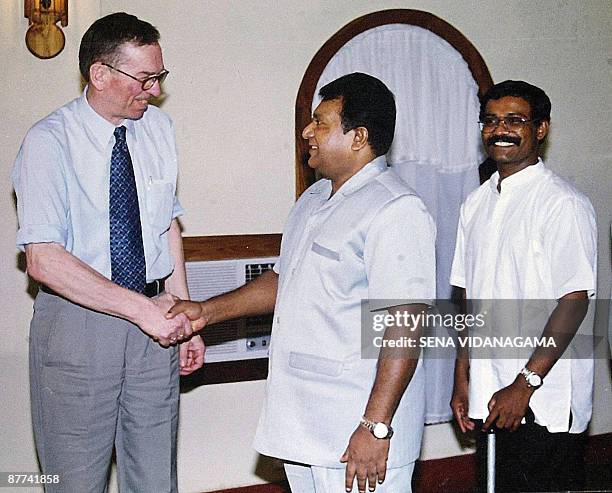 This photograph taken on March 6 shows the head of the Nordic truce monitoring team, retired Norwegian army general Trond Furuhovde , greeted by Sri...