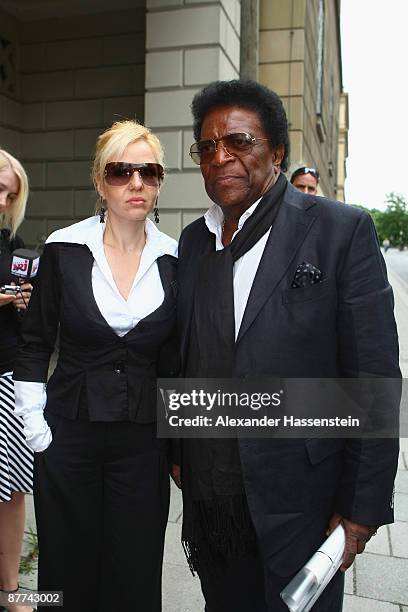 Roberto Blanco arrives with Luzandra Strassburg for the Monti Lueftner funeral at the Allerheiligen-Hofkirche on May 18, 2009 in Munich, Germany....