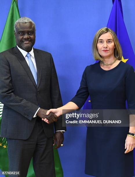 Chairperson of the African Union Commission Moussa Faki Mahamat is welcomed by EU foreign policy chief Federica Mogherini at the European Commission...