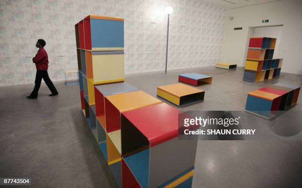 Visitor attends a press view to unveil a new wing Energy and Process at the Tate Modern gallery in central London, on May 18, 2009. It will explores...