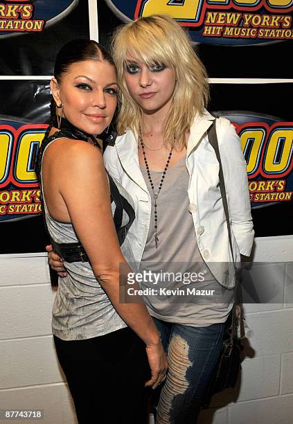 Fergie and Taylor Momsen backstage at Z100's Zootopia 2009 presented by IZOD FRAGRANCE at Izod Center on May 16, 2009 in East Rutherford, New Jersey.
