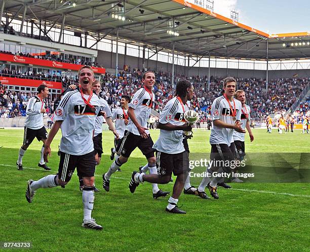 Christopher Buchtmann of Germany celebrates with his team during the Uefa U17 European Championship Final between Netherlands and Germany at the...