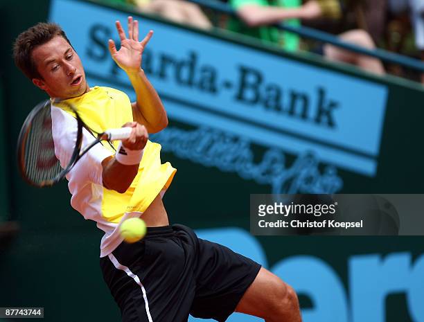 Philipp Kohlschreiber of Germany plays a forehand during his match against Robby Ginepri of the USA during day two of the ARAG Team World Cup at the...