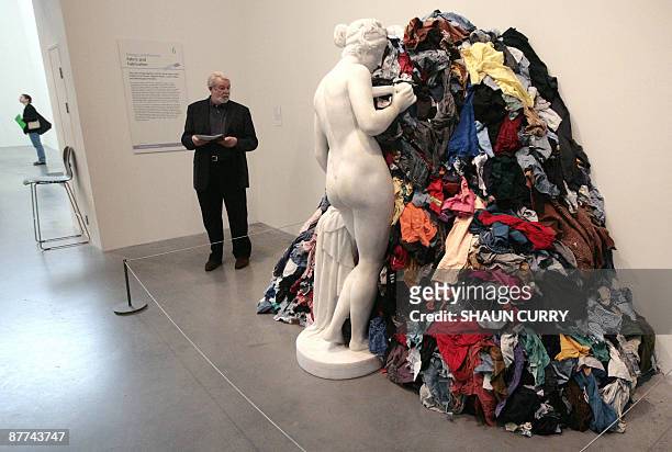 Visitors attend a press view for the unveiling of a new wing Energy and Process at the Tate Modern gallery in central London, on May 18, 2009. It...