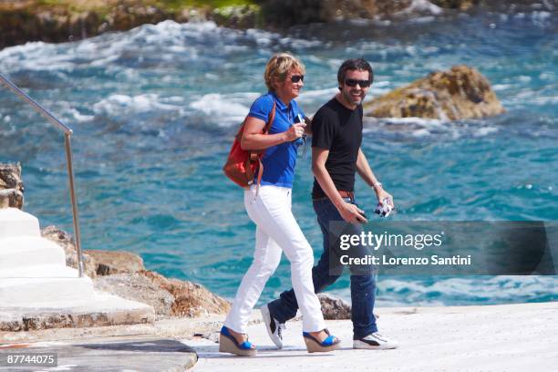 Arianne Massenet and Yann Barthes leave the Hotel du Cap - Eden Roc of Cap d'Antibes on May 18, 2009 in Cannes, France.