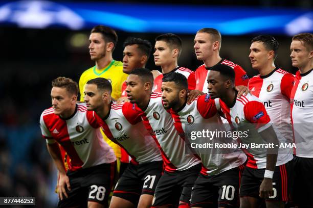 Players of Feyenoord pose for a team photo during the UEFA Champions League group F match between Manchester City and Feyenoord at Etihad Stadium on...