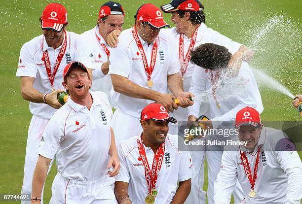 Paul Collingwood, Ravi Bopara and Andrew Strauss celebrate with team mates after their victory over the West Indies during day five of the 2nd npower...