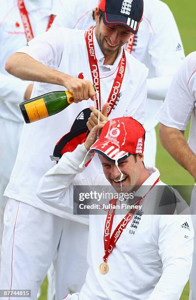 Graham Onions of England pours champagne over Andrew Strauss of England after their win over West Indies during day five of the 2nd npower test match...