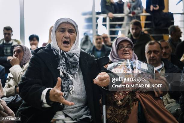 Victim's relative reacts during a live TV broadcast from the International Criminal Tribunal for the former Yugoslavia in a room at the memorial in...