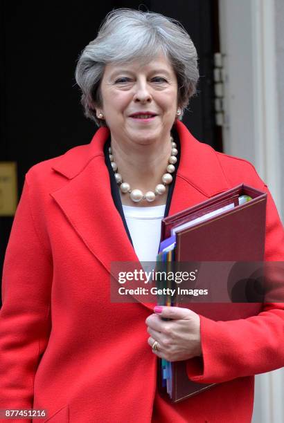 British Prime Minister Theresa May leaves after a cabinet meeting ahead of the Chancellor's annual budget at 10 Downing Street on November 22, 2017...