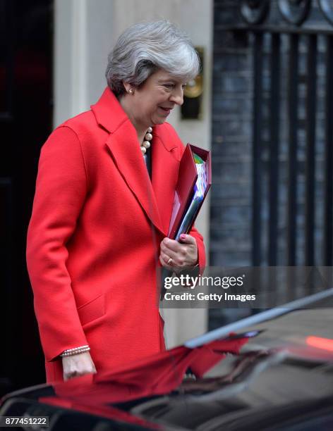 British Prime Minister Theresa May leaves after a cabinet meeting ahead of the Chancellor's annual budget at 10 Downing Street on November 22, 2017...