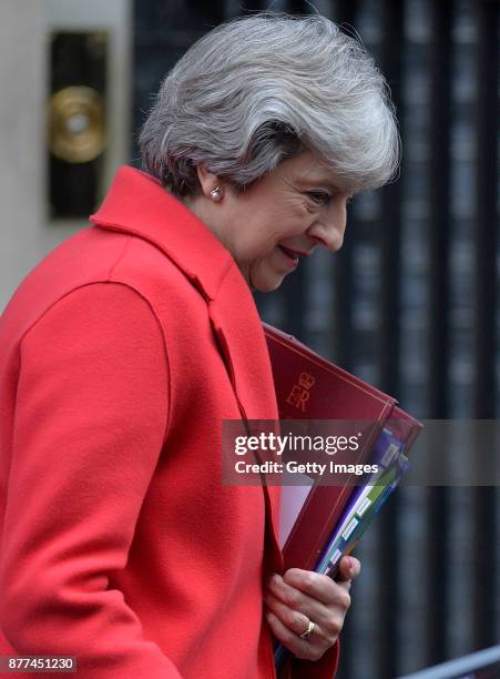 British Prime Minister Theresa May leaves after a cabinet meeting ahead of the Chancellor's annual budget at 10 Downing Street on November 22, 2017...