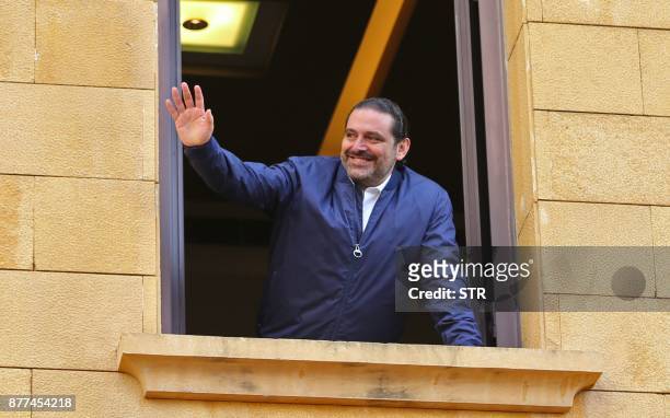 Lebanese prime minister Saad Hariri greets his supporters upon his arrival at his home in Beirut on November 22, 2017. Hariri, back in Beirut after a...