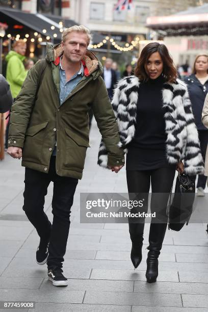 Myleene Klass seen leaving the Smooth Radio Studios with boyfriend Simon Motson before jumping in a taxi on November 22, 2017 in London, England.