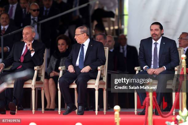 Lebanon's prime minister Saad Hariri sits next to Lebanese President Michel Aoun and speaker of parliament Nabih Berry the Independence Day ceremony...