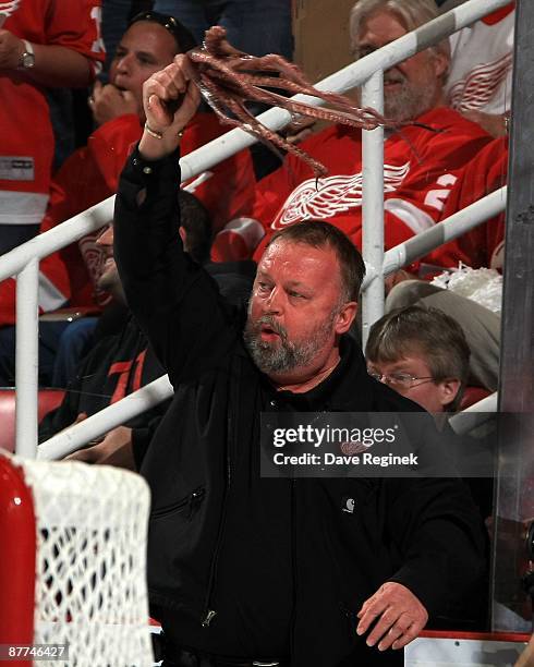 Detroit Red Wings Zamboni Driver Al Sobotka waves an octupus firing up the crowd before Game Seven of the Western Conference Semifinal Round of the...