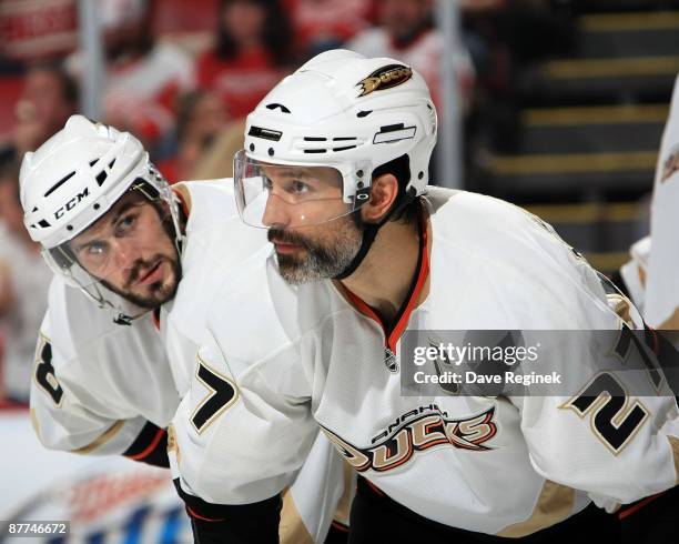 Scott Niedermayer and Drew Miller of the Anaheim Ducks line up for a face-off during Game Seven of the Western Conference Semifinal Round of the 2009...