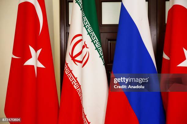 National flags of Turkey, Russia and Iran are pictured during the trilateral summit to discuss progress on Syria, between the Presidents of Turkey,...