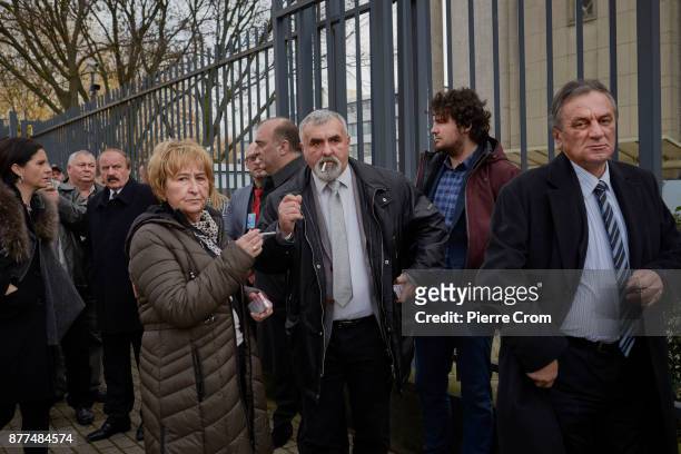 Supporters of Ratko Mladic who travelled from Republika Srpska, the Serbian entity in Bosnia and Herzegovina, leave the tribunal on November 22, 2017...
