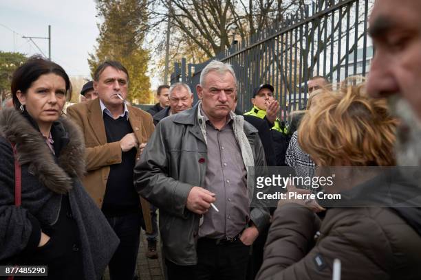 Supporters of Ratko Mladic who travelled from Republika Srpska, the Serbian entity in Bosnia and Herzegovina, leave the tribunal on November 22, 2017...