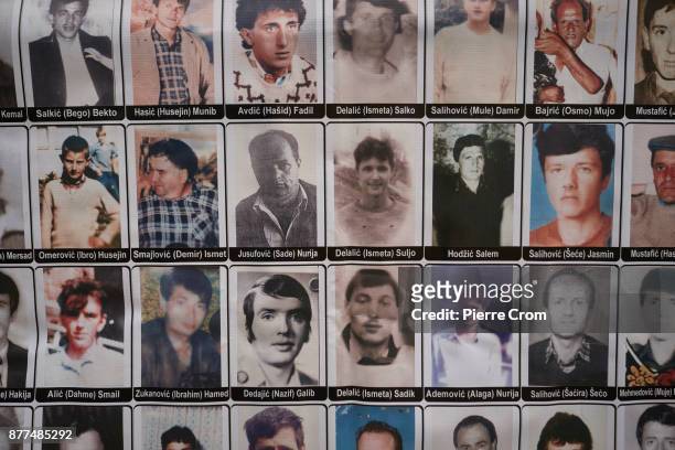 Bosnian Muslim victims are seen on a banner outside the International Criminal Tribunal for the former Yugoslavia on November 22, 2017 in The Hague,...