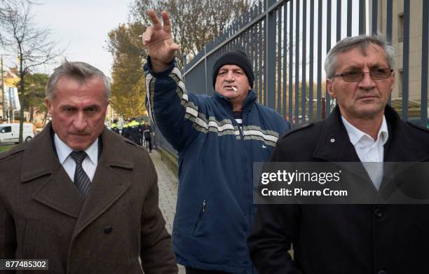 Supporter of Ratko Mladic makes the Serbian nationalist sign outside the tribunal on November 22, 2017 in The Hague, The Netherlands. Ratko Mladic's...