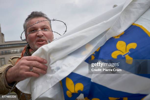 Bosnian Muslim man demonstrates outside the tribunal on November 22, 2017 in The Hague, The Netherlands. The International Criminal Tribunal for the...