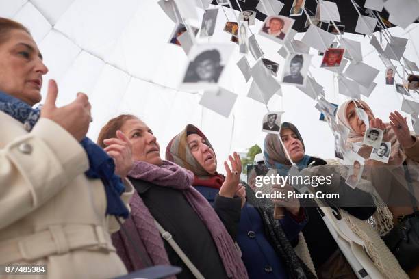 Bosnian Muslim women pray inside a makeshift memorial for Bosnian Muslim victims on November 22, 2017 in The Hague, The Netherlands. The...