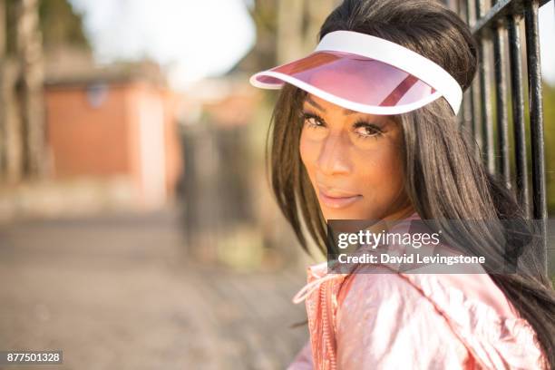 drag queen looking to camera - david levingstone stock pictures, royalty-free photos & images