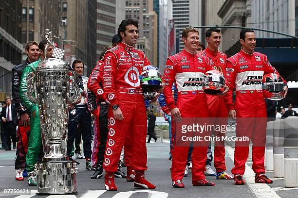 Dario Franchitti driver of the Target Chip Ganassi Racing Dallara Honda, Ryan Briscoe driver of the Team Penske Dallara Honda and Helio Castroneves,...