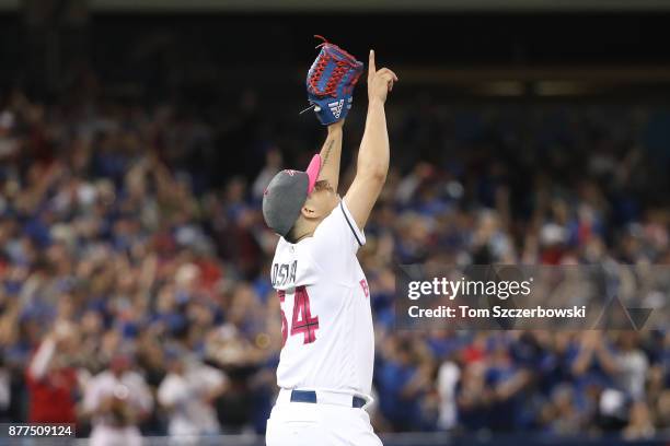Roberto Osuna of the Toronto Blue Jays celebrates after getting the last out of their victory during MLB game action against the Seattle Mariners at...