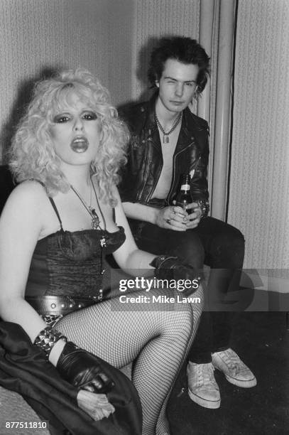 English bassist and singer Sid Vicious with girlfriend Nancy Spungen in the backstage of the Electric Ballroom in Camden, London, UK, 15th August...